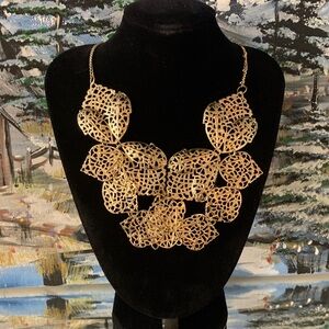 Elegant Gold Tone Leaf Statement Necklace With Jasmine Lane Earrings.
